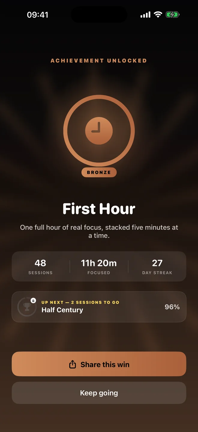 The First Hour achievement screen, showing a bronze badge earned for one full hour of focus.